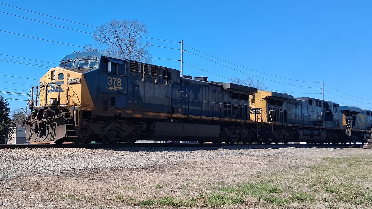 Csx 378 leads mixed with csx 405 & csx 6528 trailing 