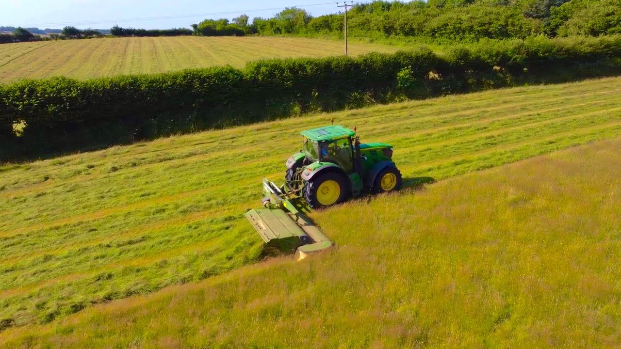 John Deere 6140R & 6155R Mowing Grass