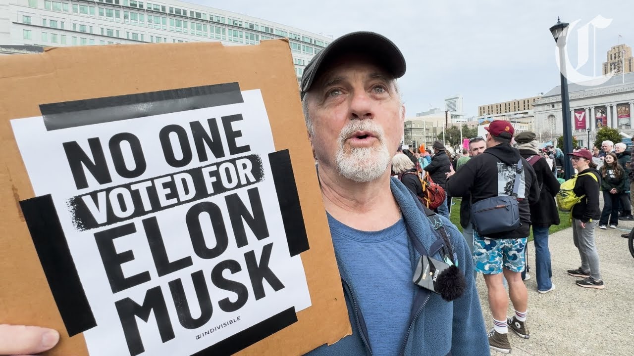 Hundreds protest Trump and Musk at S.F. City Hall, chanting ‘No kings on Presidents’ Day’