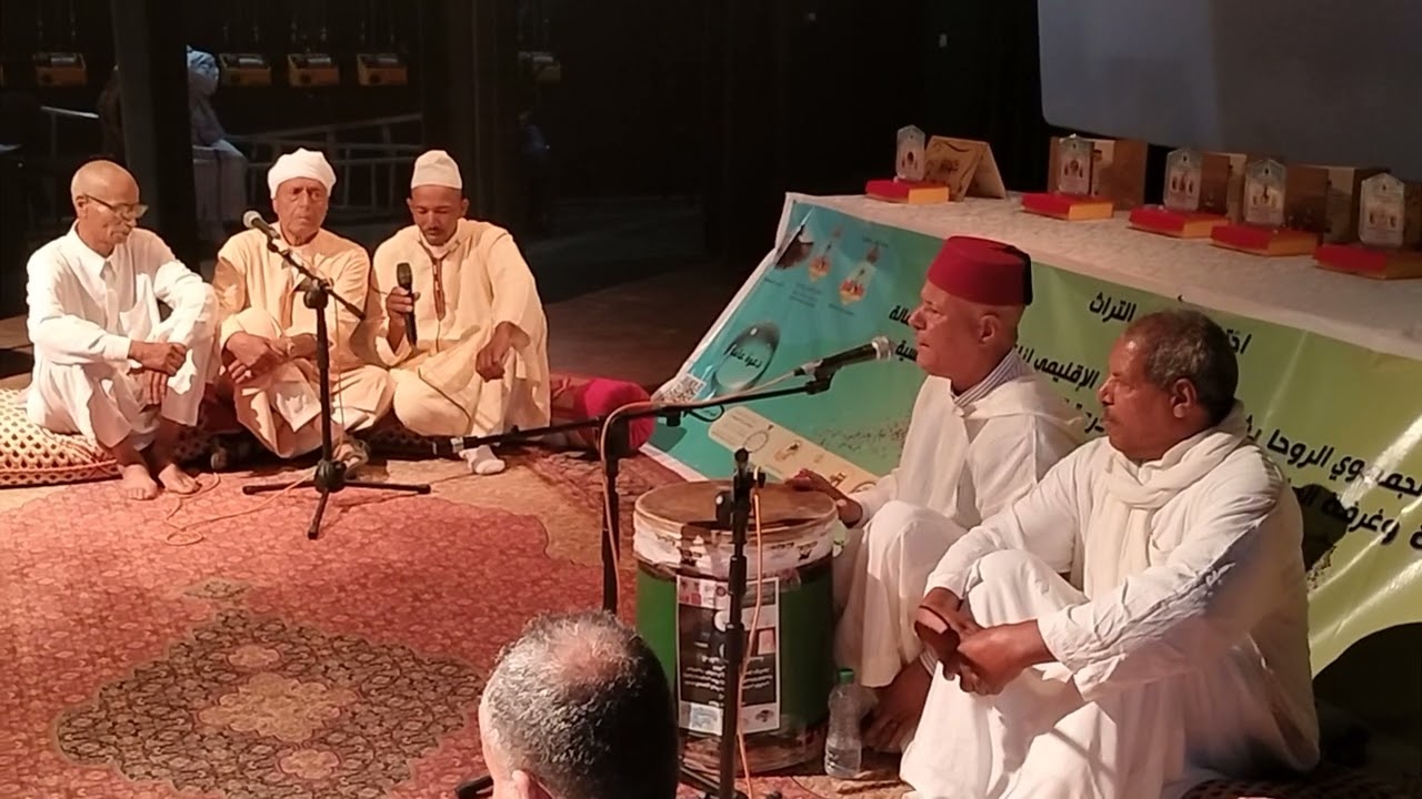 مقطع رائع من فن الرسمة(الشعر الدرعوي الاصيل) الشيخ والشاعر محمد العكيدي