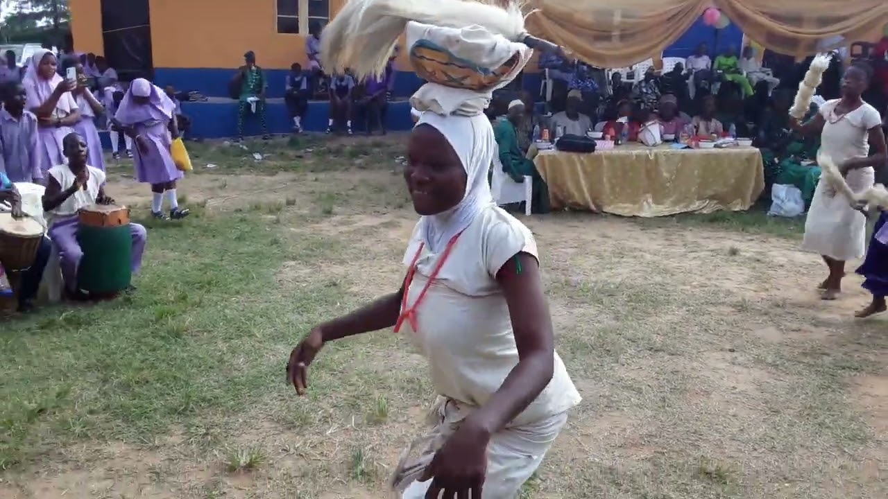 Children of Okota Senior Grammar School, Lagos, Nigeria celebrate principal; Mrs. Victoria Agedah.