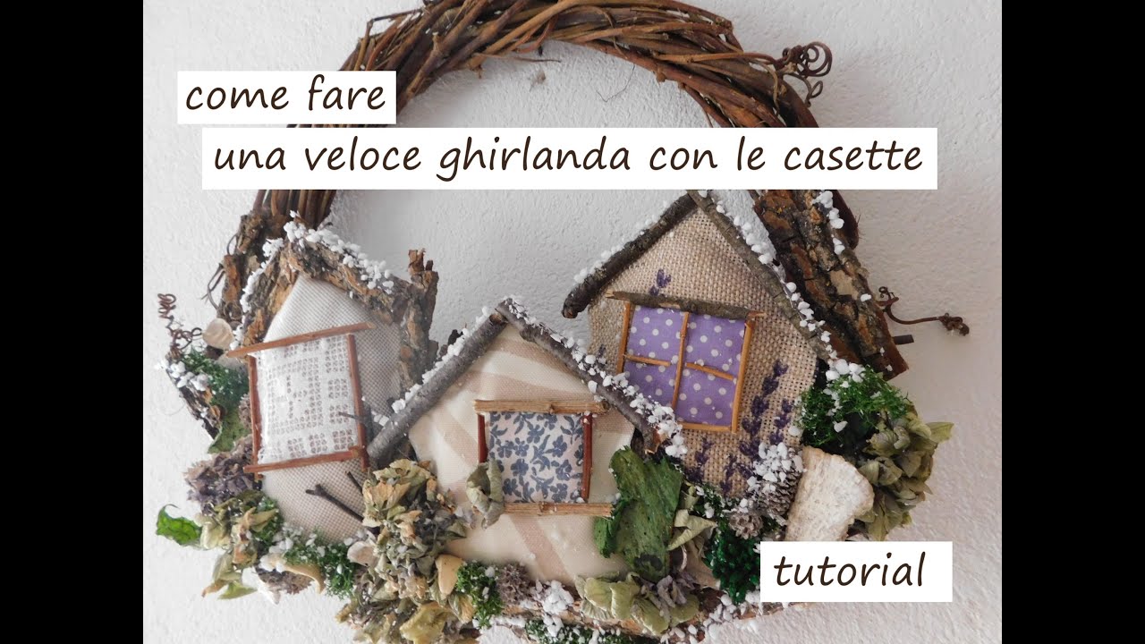 Veloce ghirlanda natalizia con le casette di stoffa