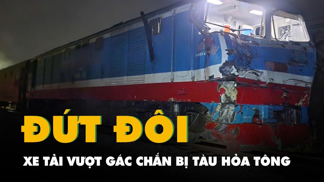 Video xe tải vượt gác chắn mắc kẹt ở đường ray, bị tàu hỏa tông đứt đôi