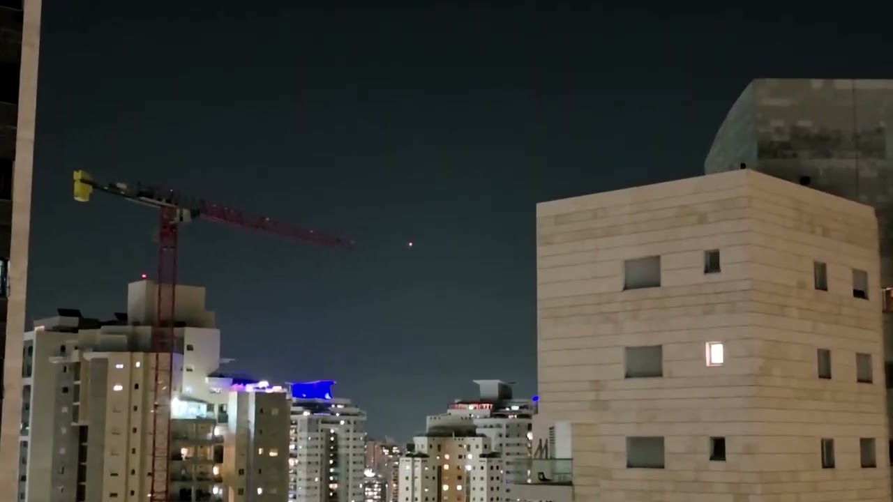 Iranian missiles streak across sky over Israel