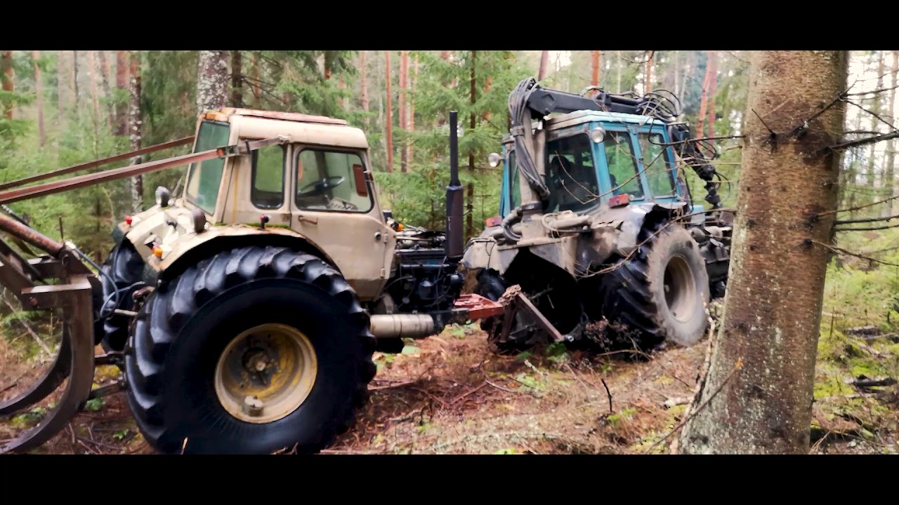 Broken tractor in the forest . В лесу лопнул передний брус МТЗ 82