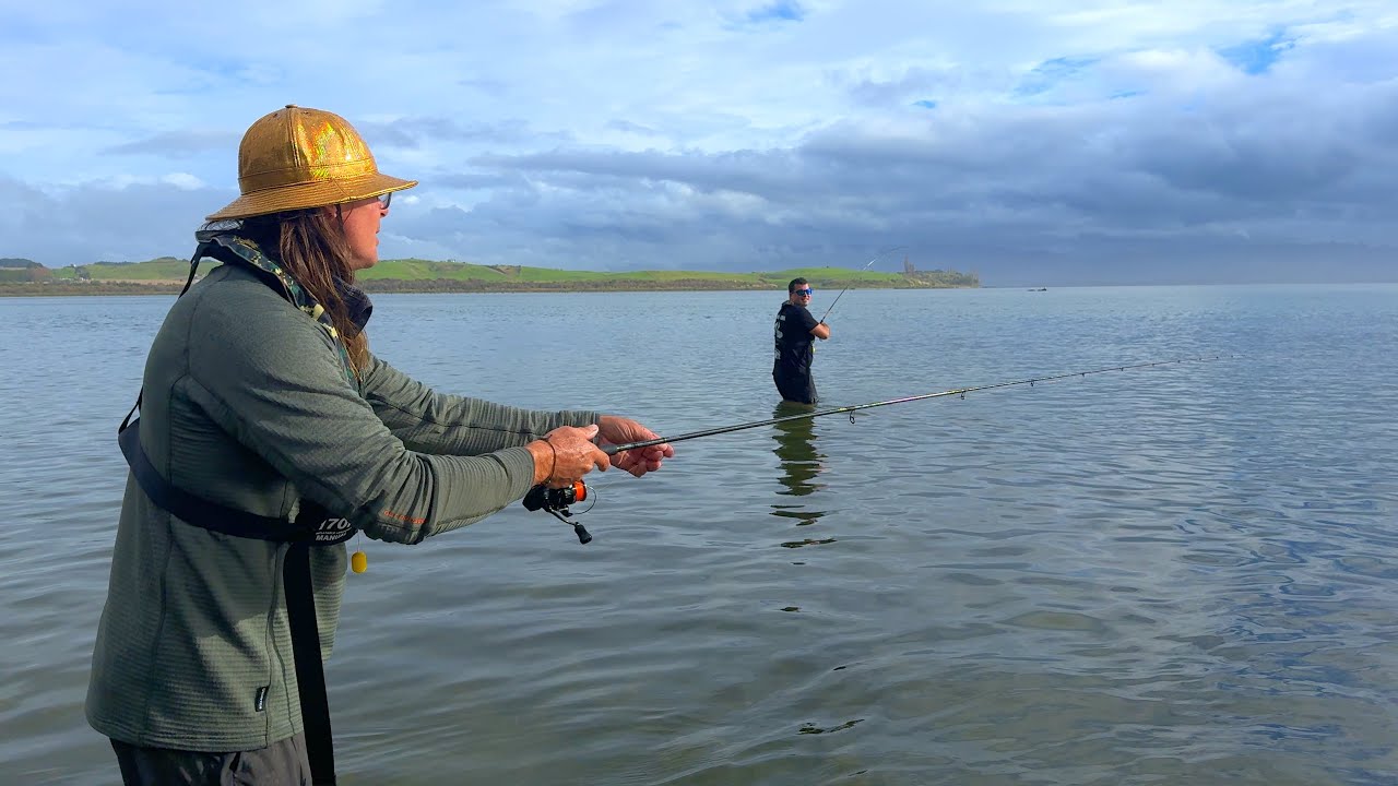 Standing in the Water Catching Fish for Dinner