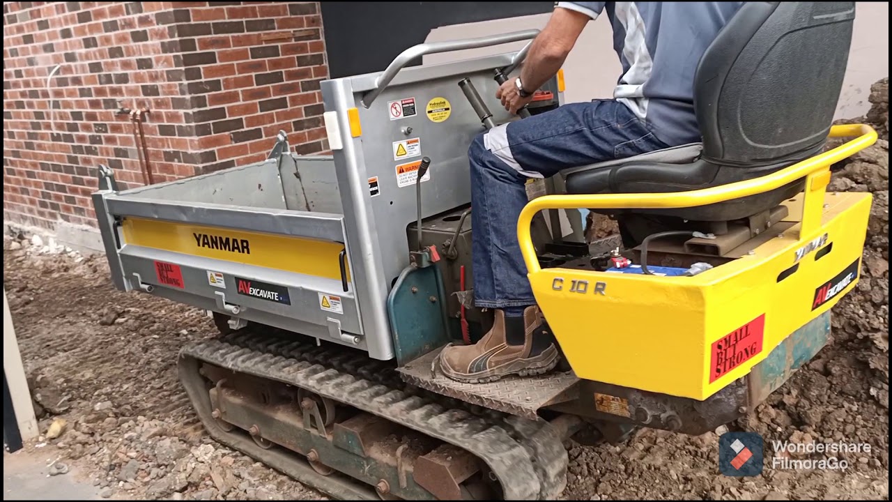 Mini Excavation - Yanmar SV-08 excavator and Yanmar C10R dumper moving soil to back yard