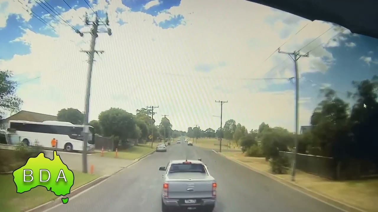 BAD Driving Australia - Truck has little time to react car overtakes then tries to turn right!