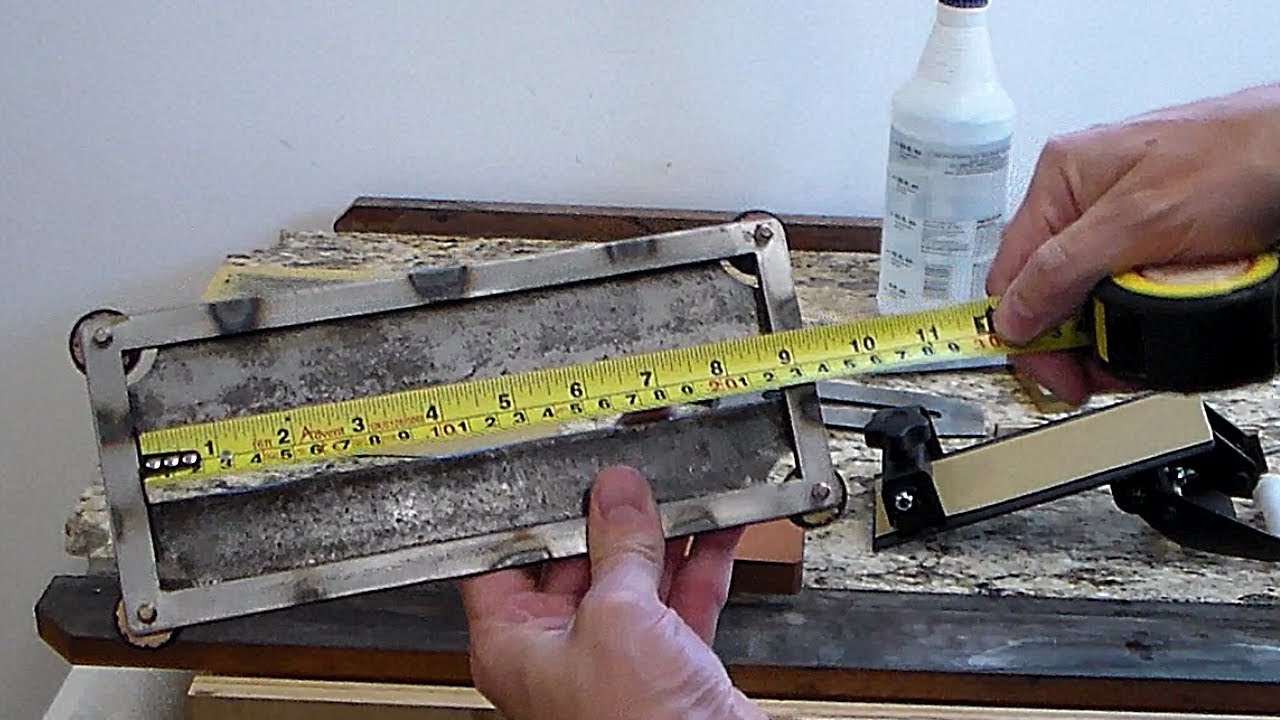 1 of 2 SHARPENING USING WATER STONE HOLDER WITH LEVELING MECHANISM