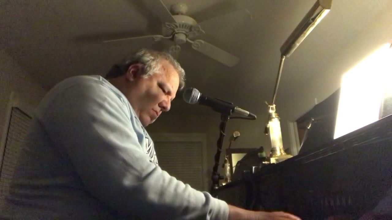 I Guess that's Why They Call it the Blues (1984) - Elton John - Performance by Mike Evans