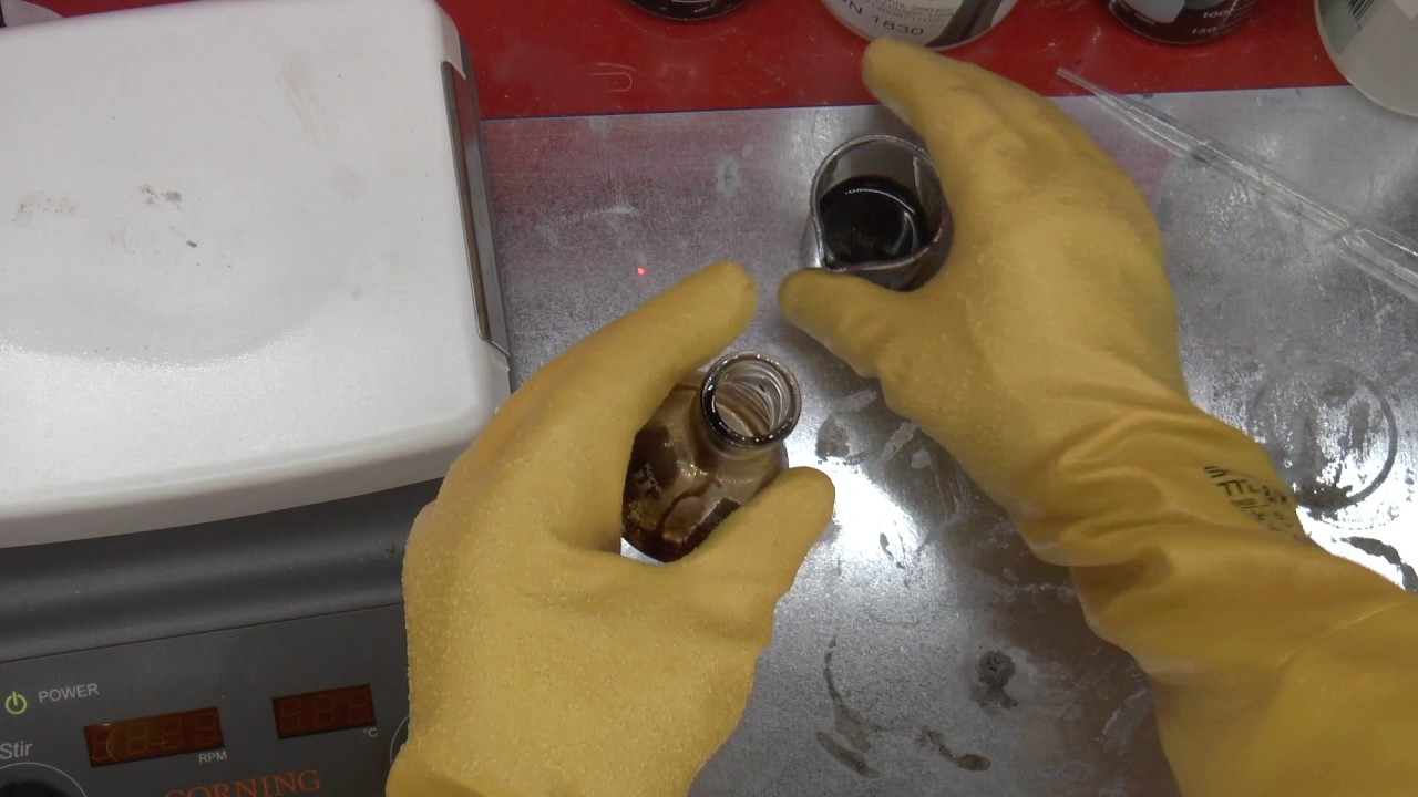 Decapsulating a plastic packaged IC with hot sulfuric acid