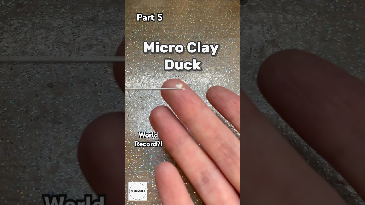 Breaking my own record - it&rsquo;s even SMALLER! #mekiandpea #clayart #microartist #duck