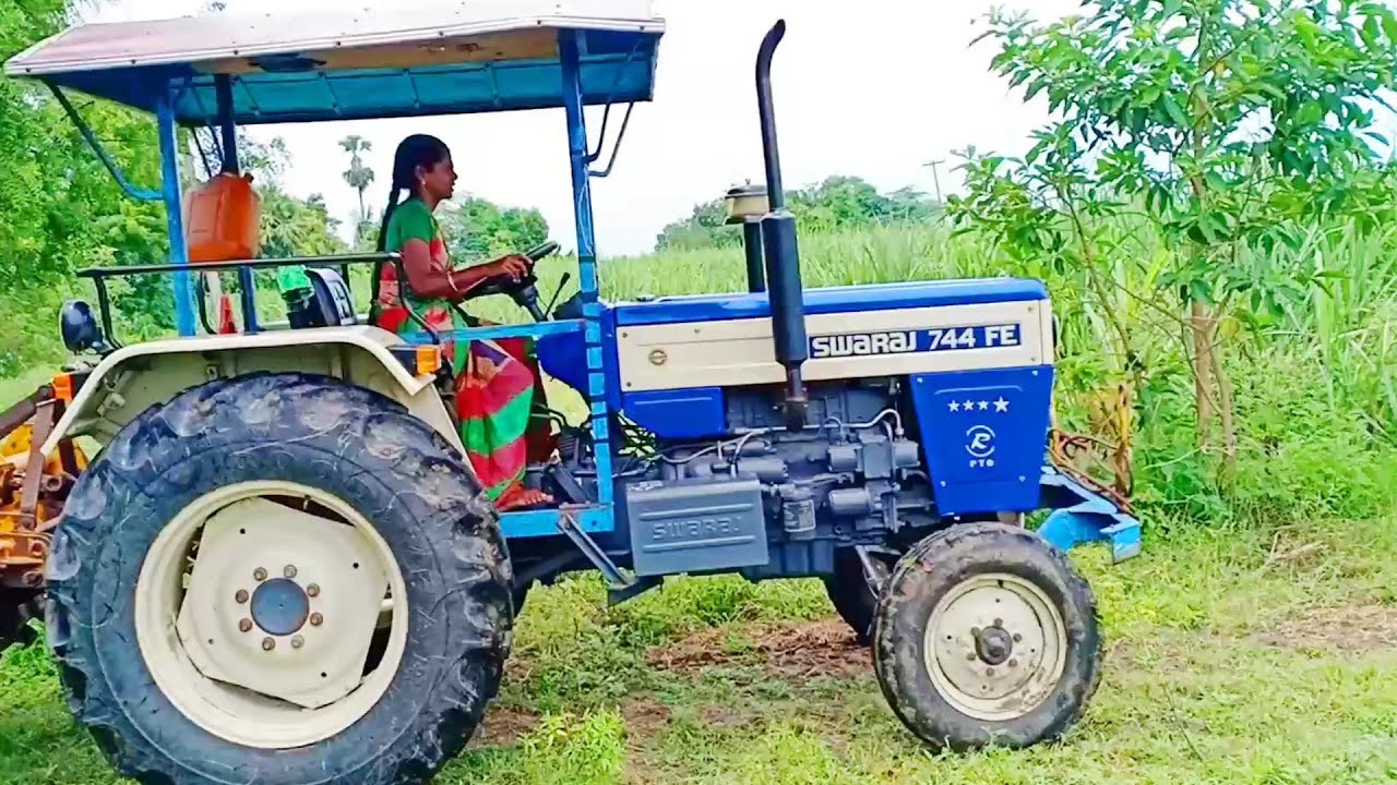 village girl driving swaraj 744 FE tractor VILLAGE GIRL draving tractor /girl on tractor#