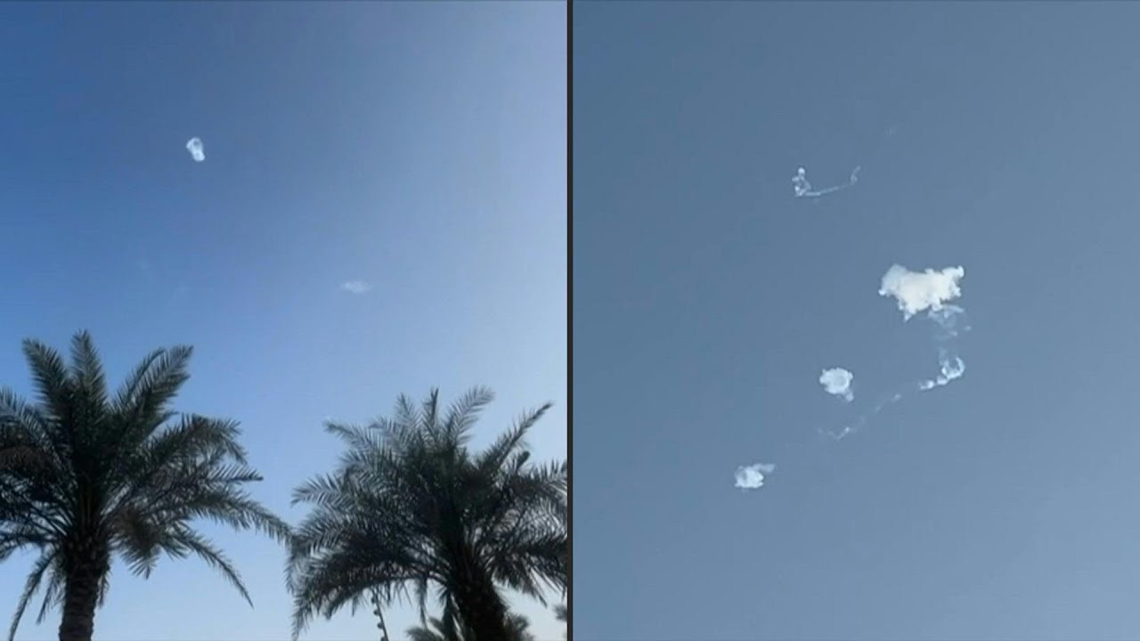 Trails of smoke following missile interceptions over Abu Dhabi | AFP