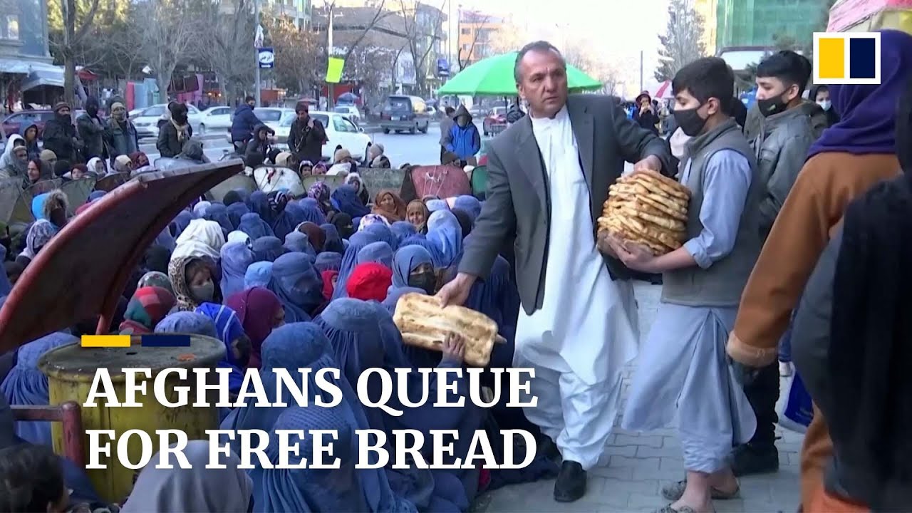 Starving Afghans queue for free bread as Kabul bakery donates food to needy