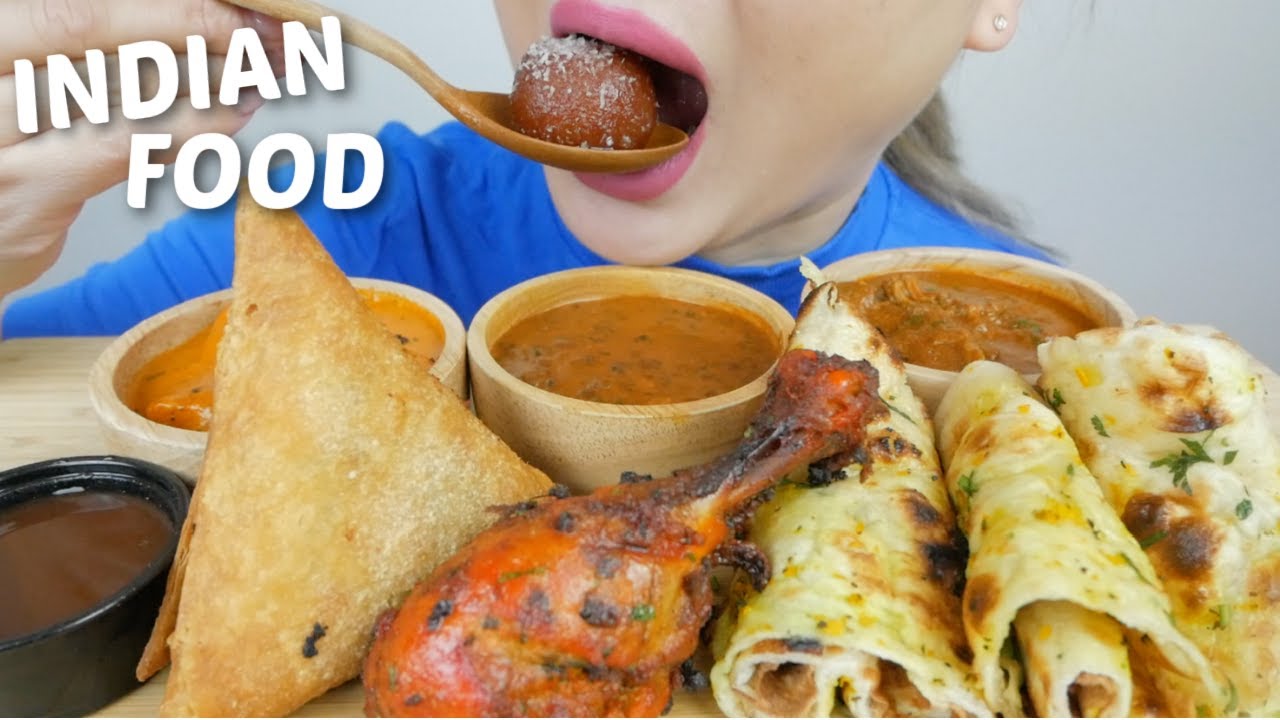Indian FOOD *Lamb Curry, Chicken Samosa, Spicy Tandoori Chicken and Butter Chicken with Garlic Nan