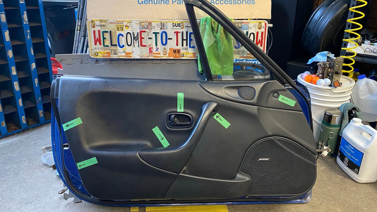 1999-2005 Mazda Miata interior door panel removal.