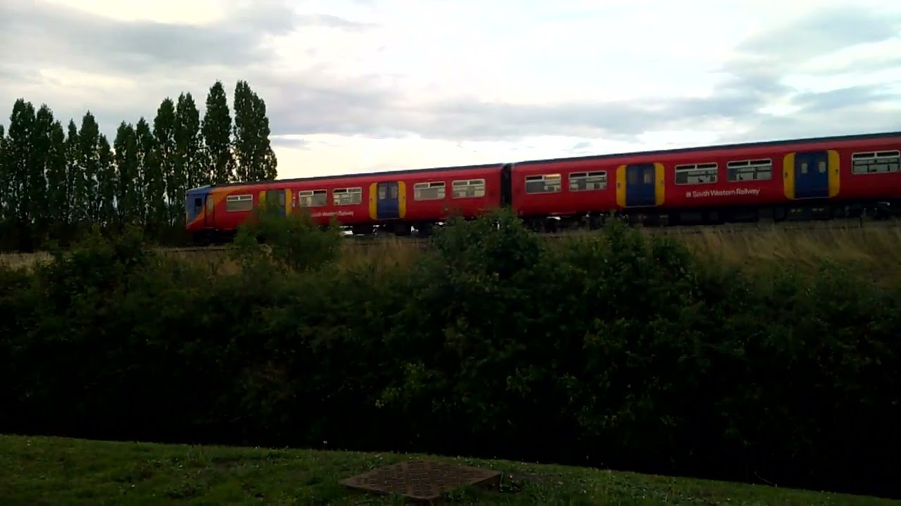 Class 455s passing Cobham service station