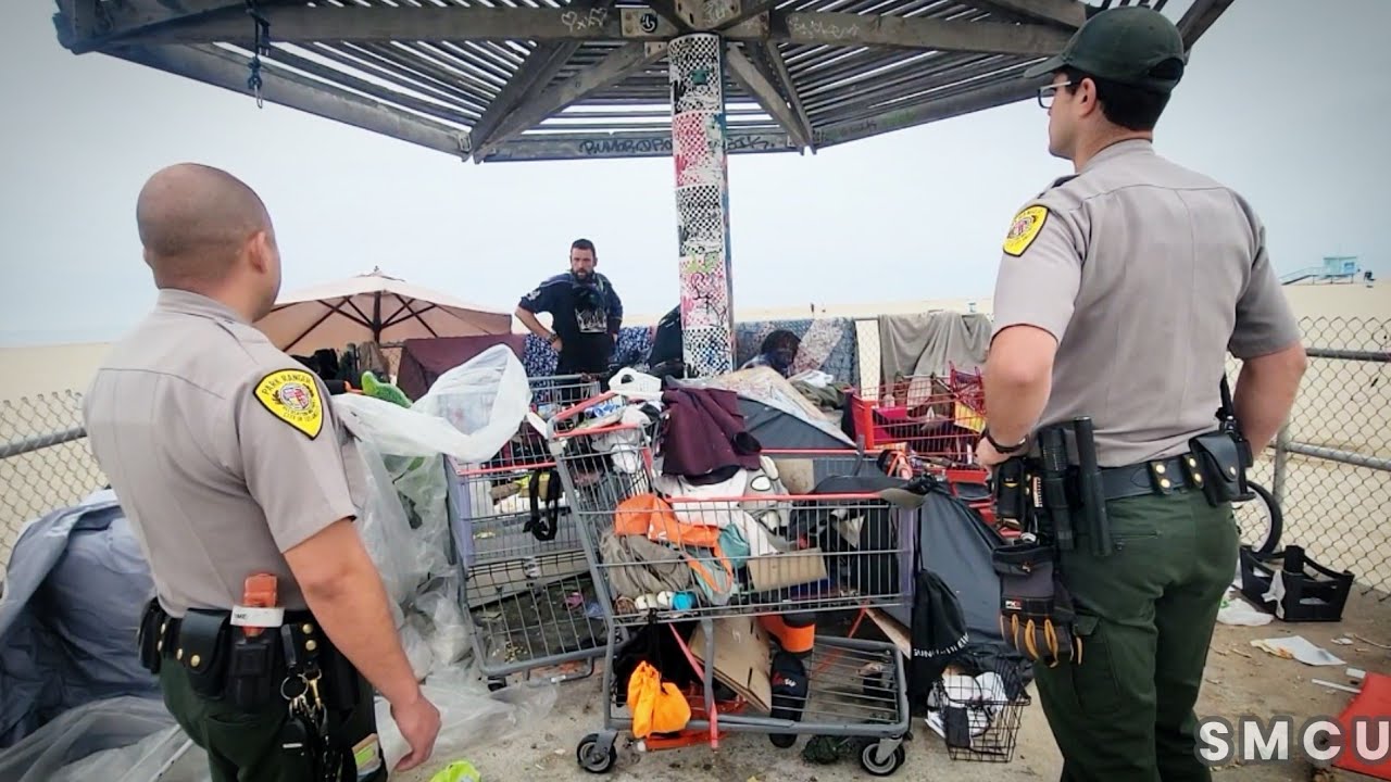 Persistent Homeless Individual Defies Park Rangers, Refuses to Cooperate with Clean-up Operation