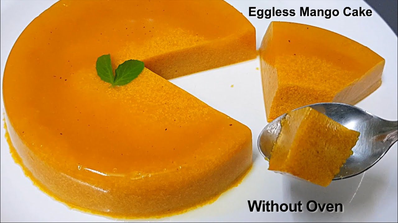Aam ka Cake /बिना सूजी, दही,कंडेंस्ड मिल्क,क्रीम,बटर पेपर, ओवन के बनाये नए तरह का Eggless Mango Cake