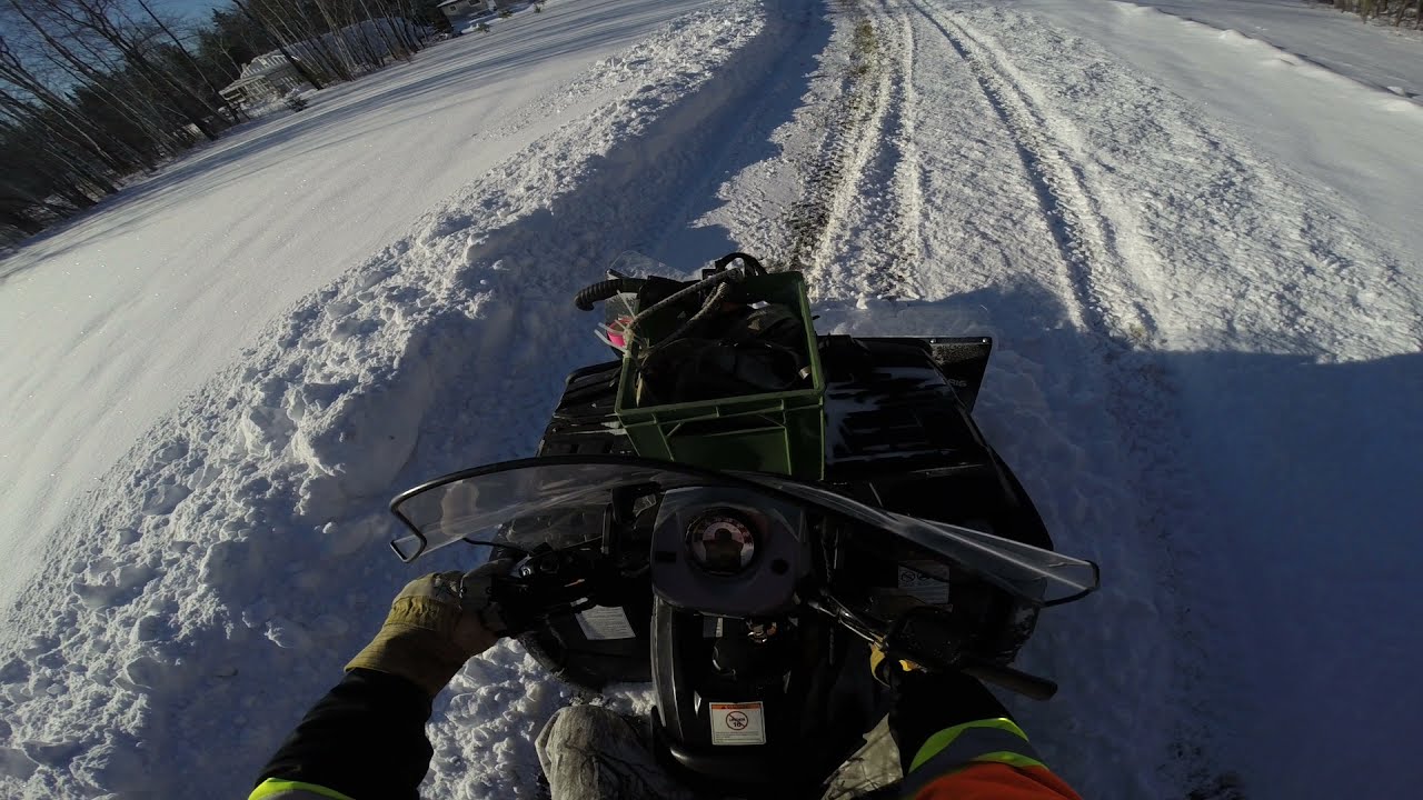 The fastest ATV snow plow / Polaris 500HO plowing snow with a modified 60inch plow