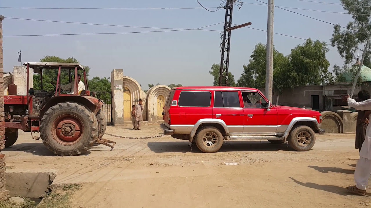 Toyota Land cruiser vs Russian Tractor - Tug of war 