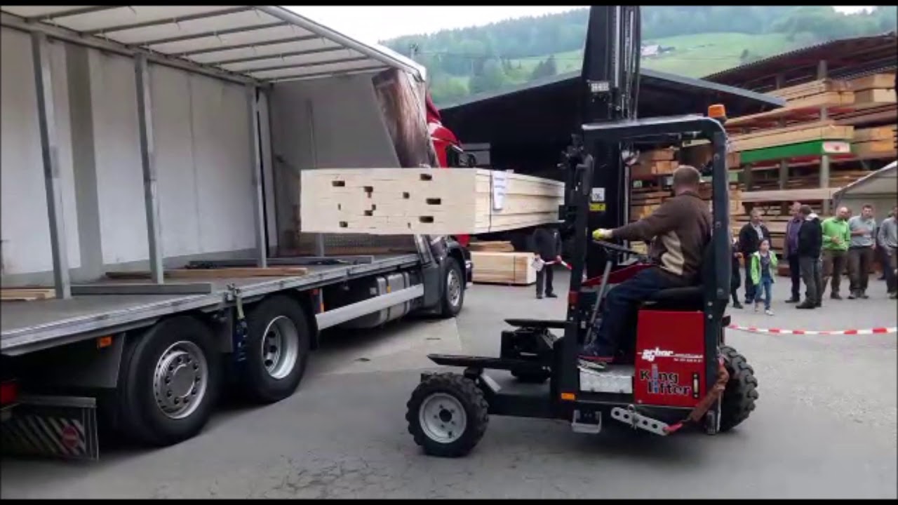 Holzbalken abladen mit TERBERG Mitnahmestapler