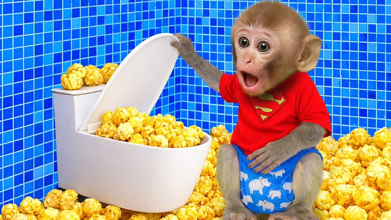 Mono Luna lluvia de palomitas de ma&iacute;z arco&iacute;ris y es un buen hermano mayor que cuida a los patos🍿🐒