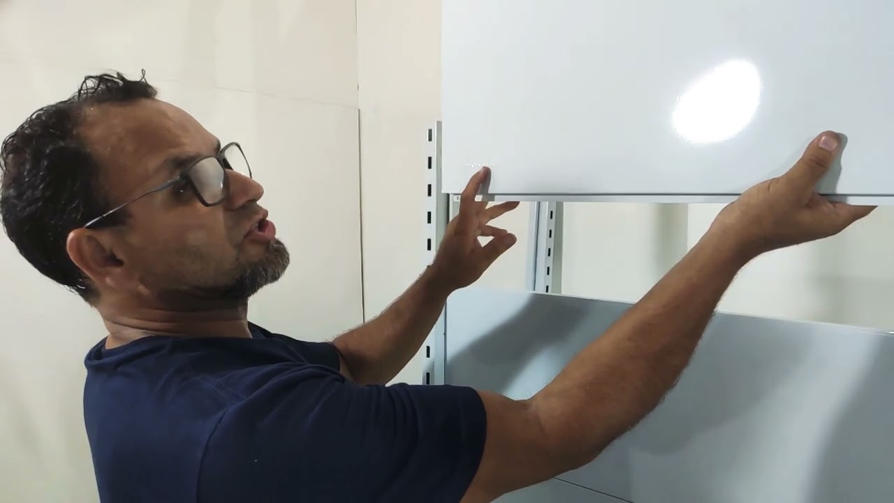 Aula 78 - Como montar uma gôndola de aço de parede da marca Amapá altura de 1,70 - Everaldo Ribeiro