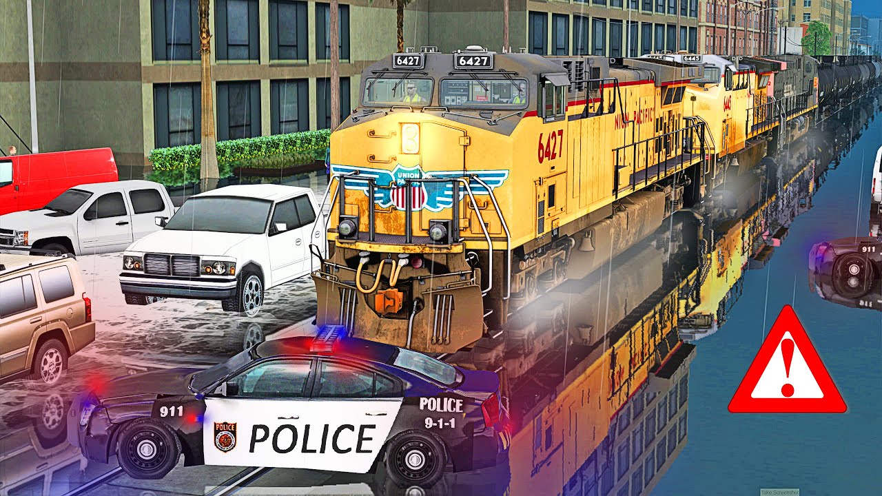 Union Pacific train through a flooded City! ⛈