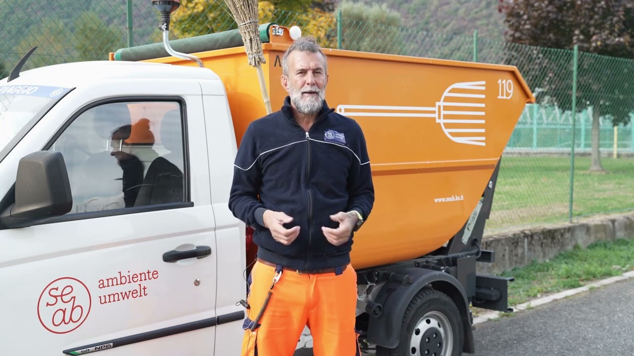 Cleaning a recycling island. A clean city starts with you.