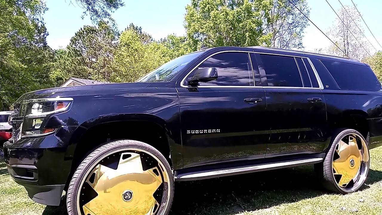 2015 Chevy Suburban on 32s Dub Chinchilla Floaters