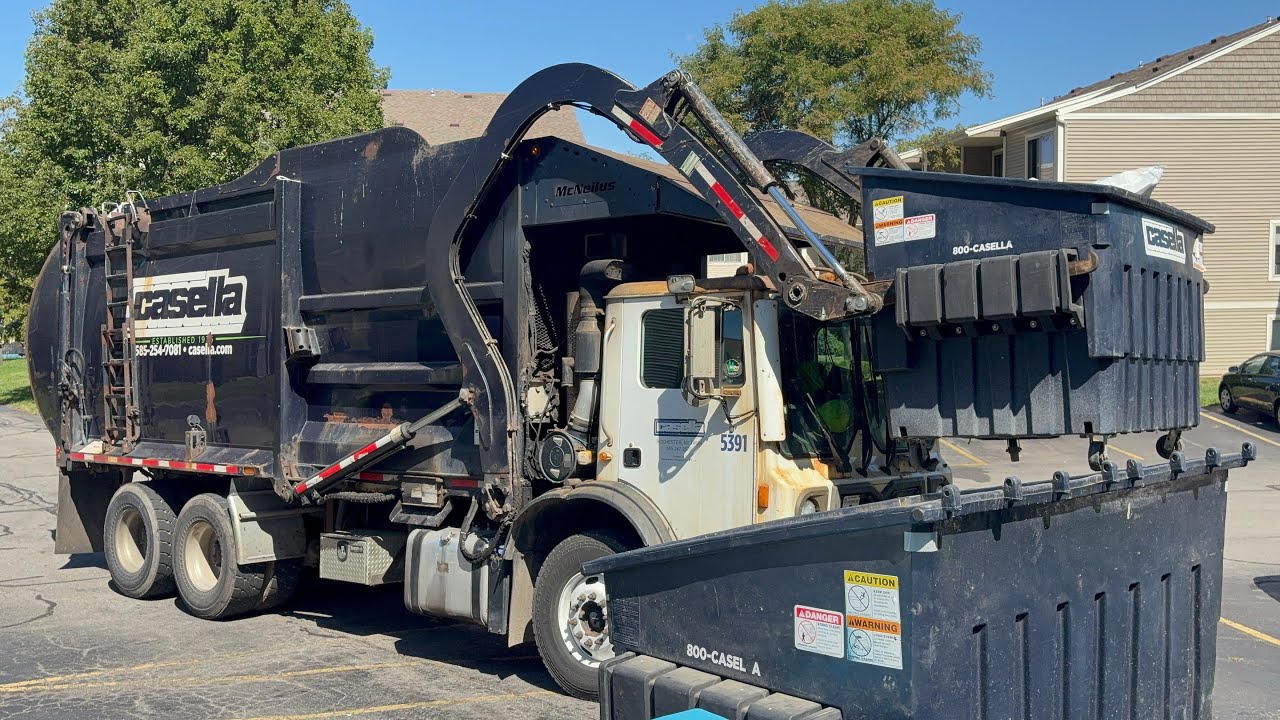 Casella Waste McNeilus Front Load Slamming Packed Dumpsters