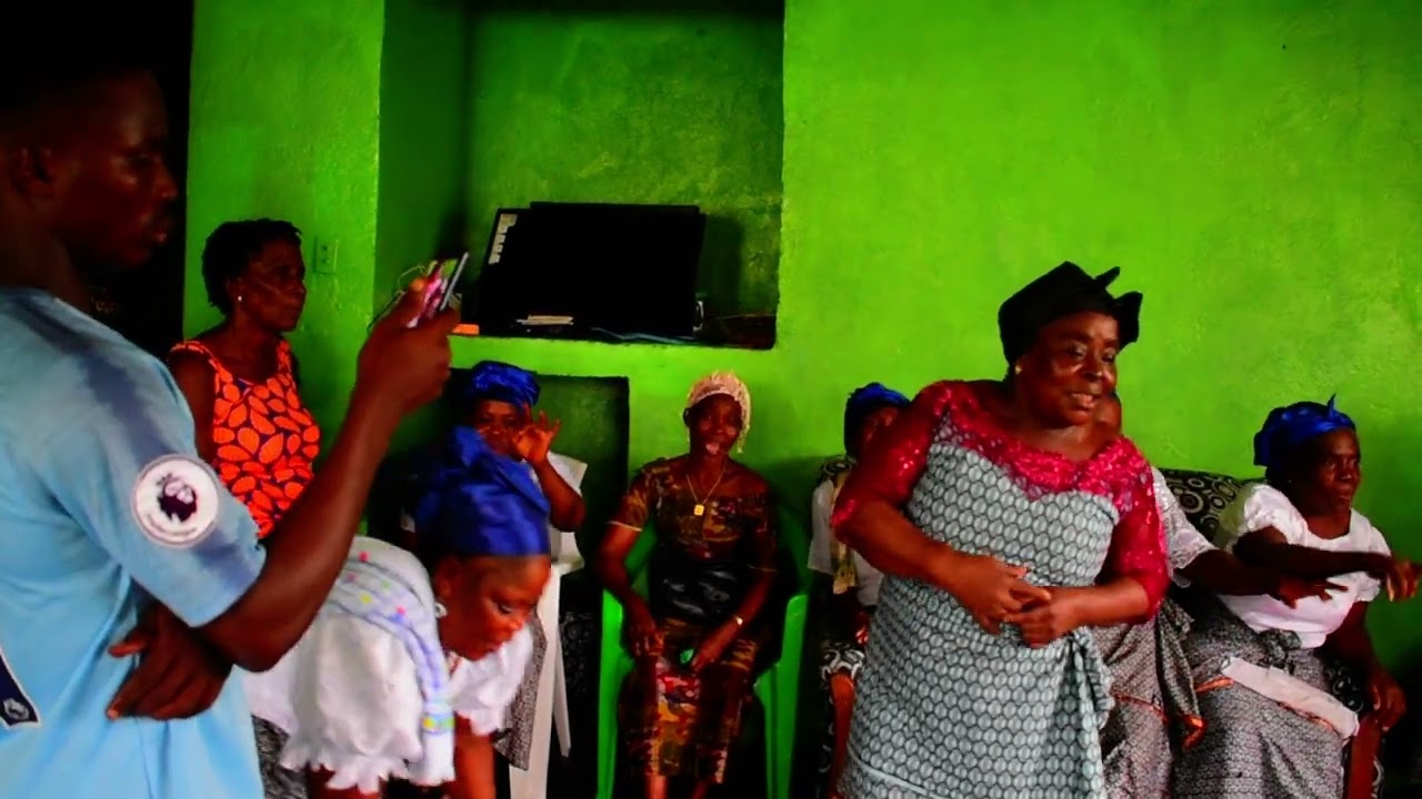 Faith and Victory Dialect Choir Welcoming Me, wife, and children to Liberia
