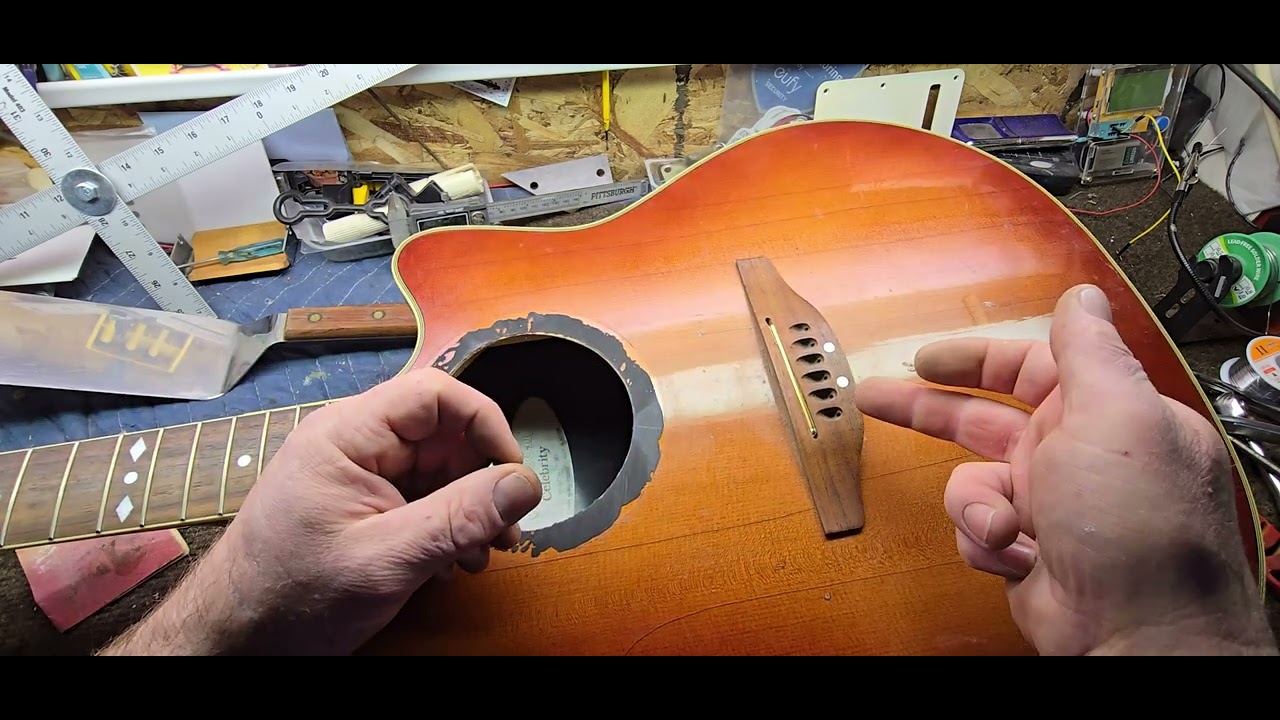 Guitar repair.  ovation celebrity bridge removal and fret board extension.  bolt on conversion prep.