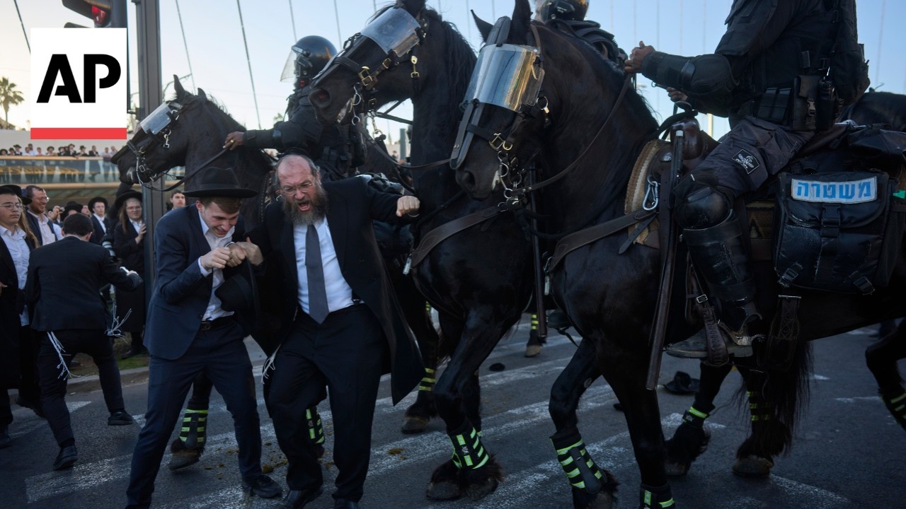 Ultra-Orthodox Israeli protesters block roads and trains over military draft