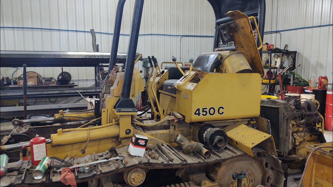 John Deere 450C dozer transmission leak