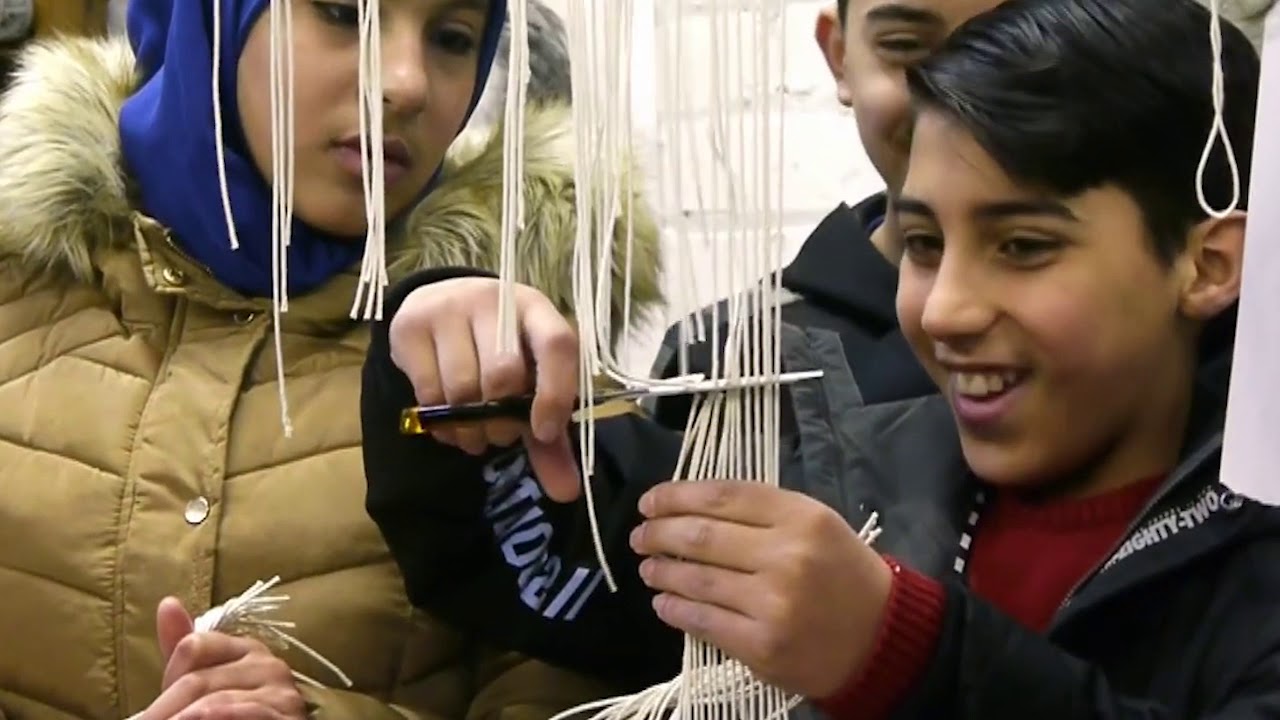 Living Local: Cutting-off a tapestry from the loom