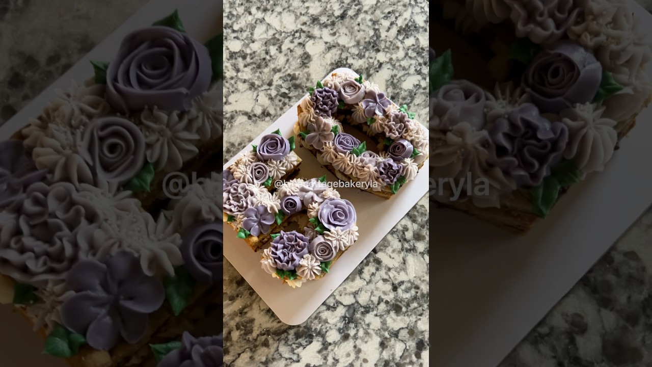 Number 50 with purple flowers #numbercakes #cookiecakes #asmr #cakevideos #cakedecorating #purple