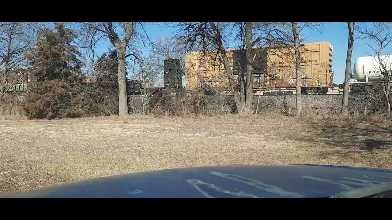 BNSF 6045 leading manifest train going west 