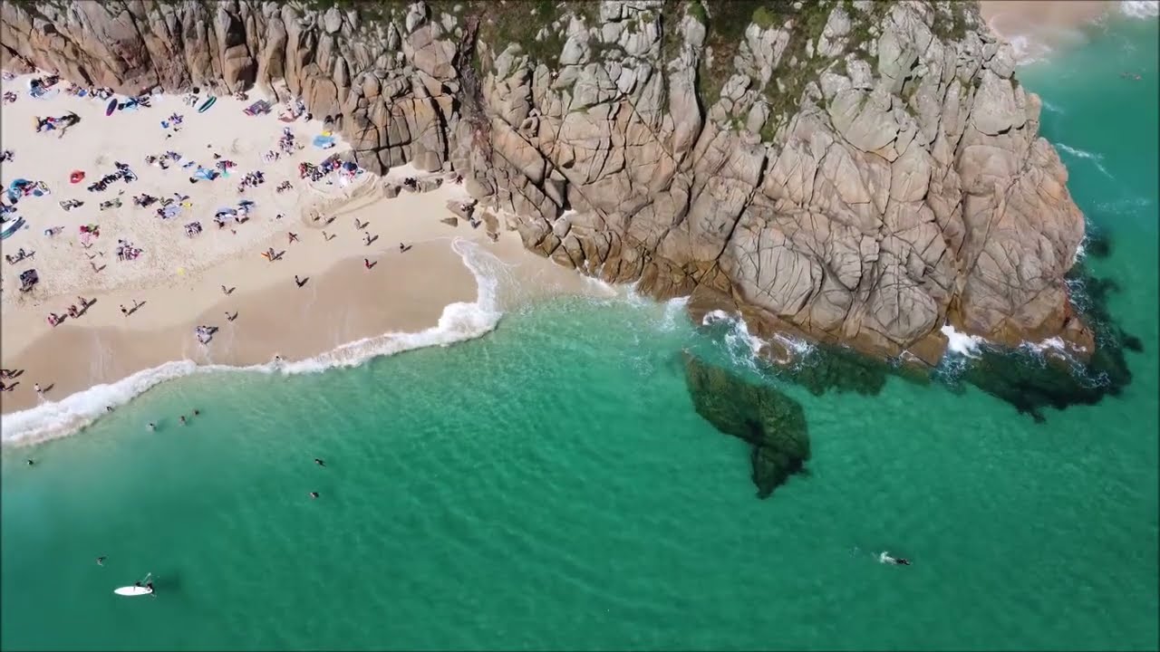 Porthcurno Beach and Minack Theatre, Cornwall, UK from drone - 16 Aug 24