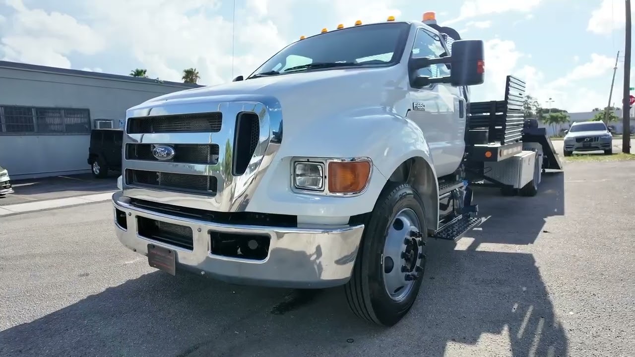 744781-For Sale: 2015 Ford F-650 Rollback Tow Truck – 22’ Body, Miller Bed, Cummins Power
