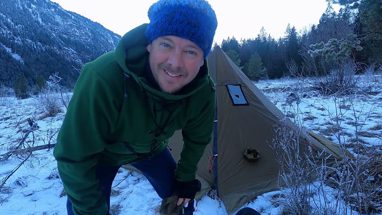 Canoe trip paddle through a winter wonderland & camping in -15c with tent stove