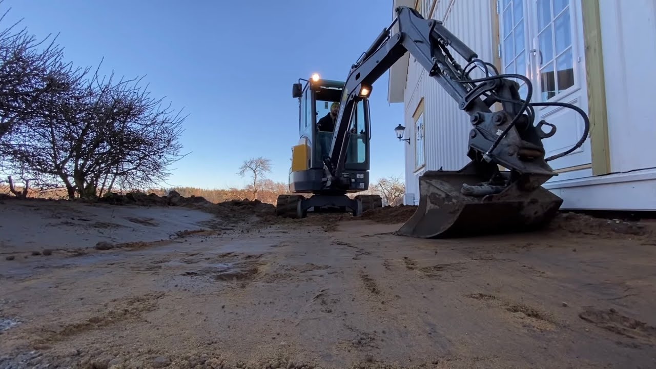 Total Makeover - of front and backyard with Volvo ECR 25!