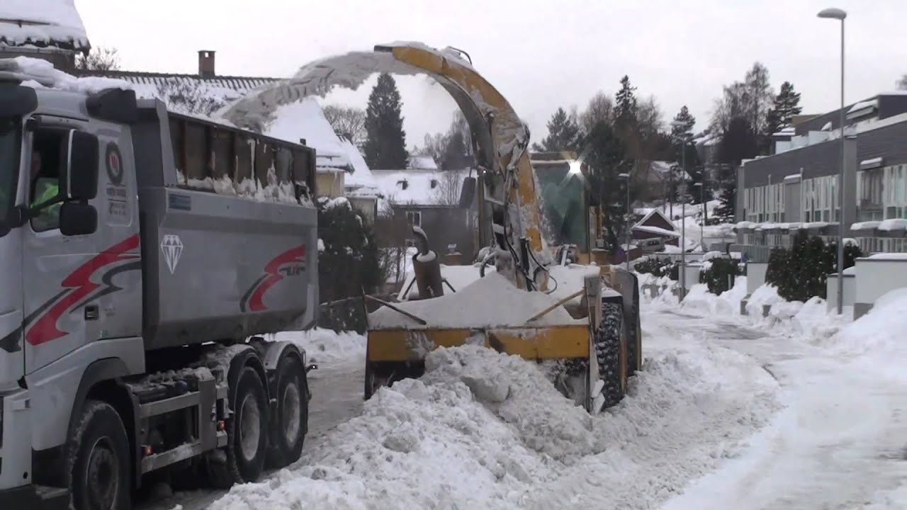 Volvo L70E with snowblower loading truck - Oslo, Norway