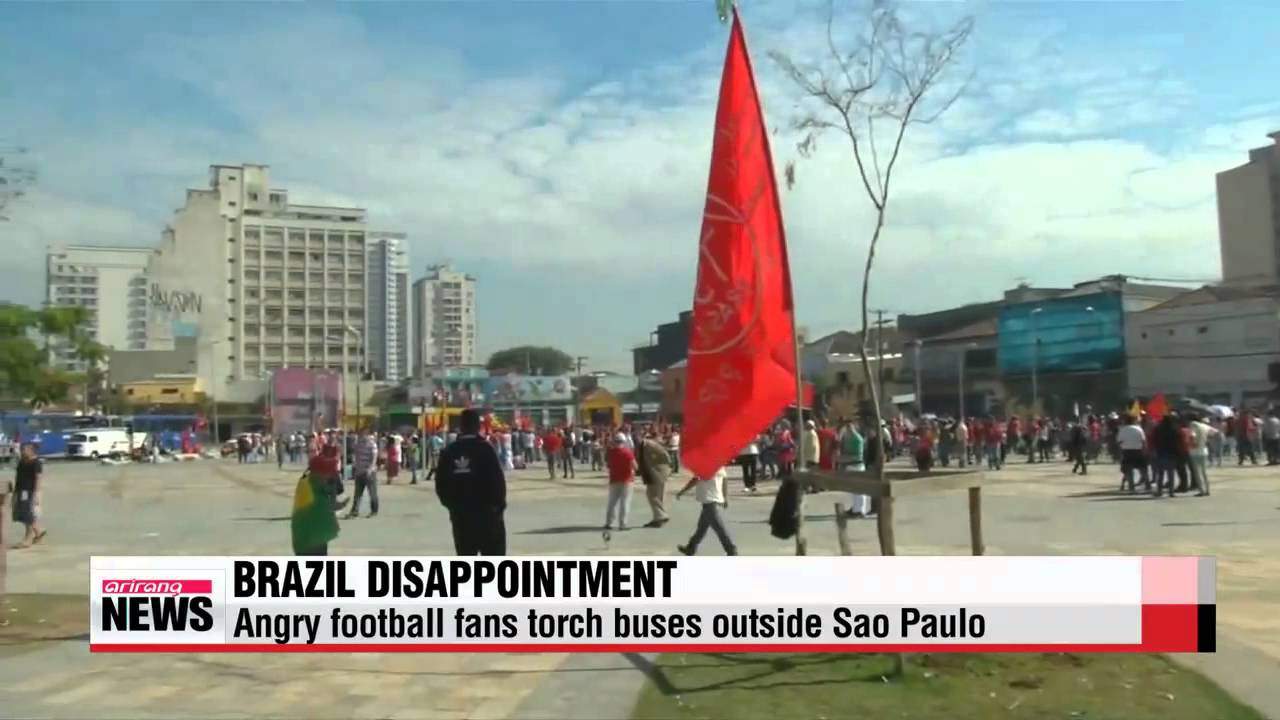 Angry football fans in Brazil torch buses