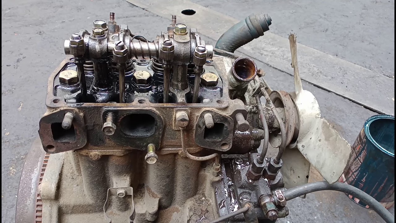 KE75 mitsubishi engine ll check oil sender and arm swinging