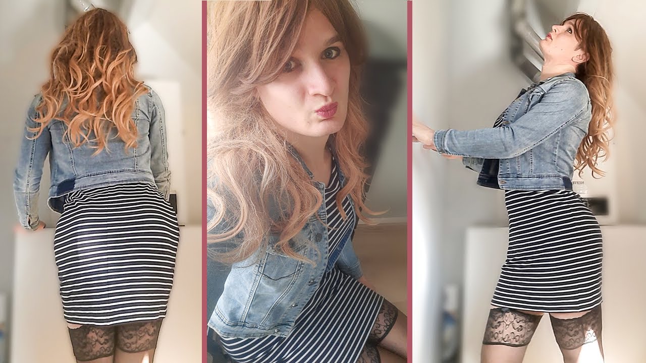 Crossdresser wearing stockings and tight dress.