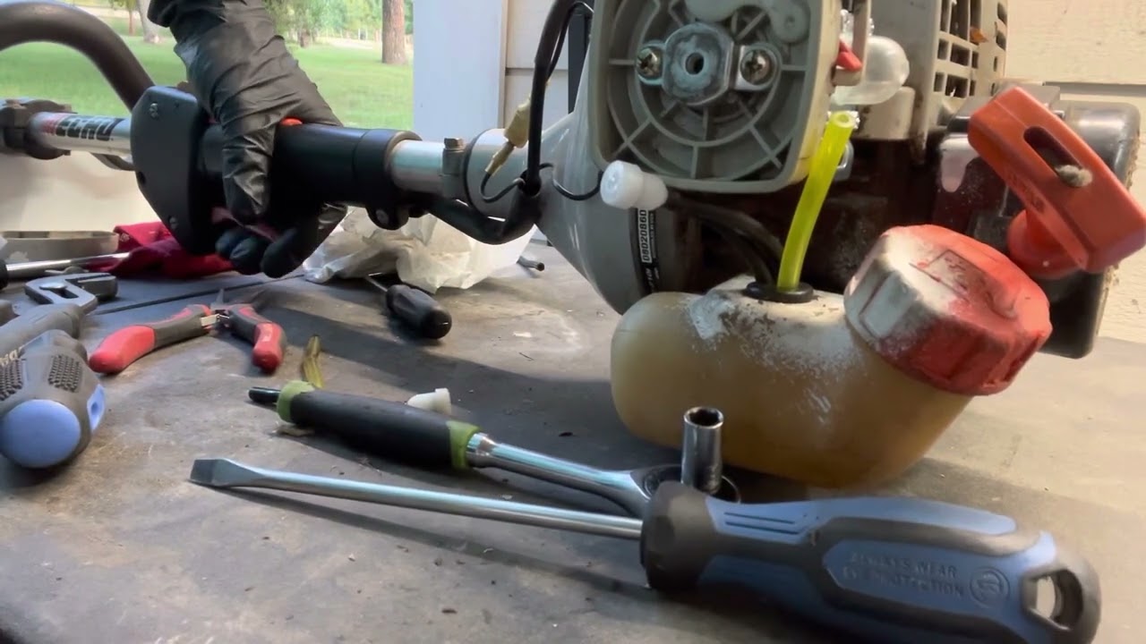 Replacing the carburetor on a Echo srm-210 weed eater.