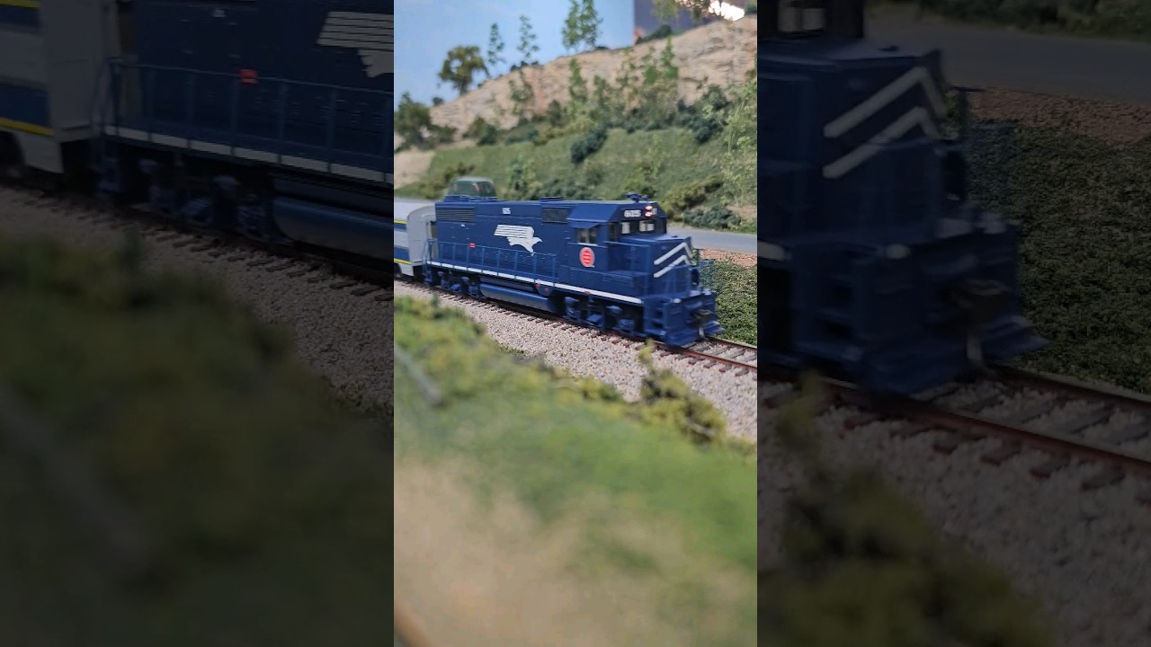 MOPAC Eagle passenger train along the hillside #missouri #pacific #Eagle #modelrailroad #train #blue